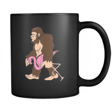 Load image into Gallery viewer, RobustCreative-Bigfoot Sasquatch Carrying Flamingo - I Believe I&#39;m a Believer - No Yeti Humanoid Monster - 11oz Black Funny Coffee Mug Women Men Friends Gift ~ Both Sides Printed
