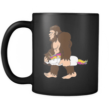 Load image into Gallery viewer, RobustCreative-Bigfoot Sasquatch Carrying Unicorn - I Believe I&#39;m a Believer - No Yeti Humanoid Monster - 11oz Black Funny Coffee Mug Women Men Friends Gift ~ Both Sides Printed
