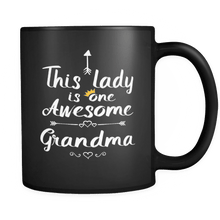 Load image into Gallery viewer, RobustCreative-One Awesome Grandma - Birthday Gift 11oz Funny Black Coffee Mug - Mothers Day B-Day Party - Women Men Friends Gift - Both Sides Printed (Distressed)
