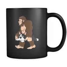 Load image into Gallery viewer, RobustCreative-Bigfoot Sasquatch Carrying Boston Terrier - Robust Creative Believes Aparel - No Yeti Humanoid Monster - 11oz Black Funny Coffee Mug Women Men Friends Gift ~ Both Sides Printed
