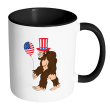 Load image into Gallery viewer, RobustCreative-Bigfoot Sasquatch Baloon American Flag - 4th of July American Pride Apparel - Merica USA Pride - 11oz Black &amp; White Funny Coffee Mug Women Men Friends Gift ~ Both Sides Printed

