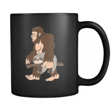 Load image into Gallery viewer, RobustCreative-Bigfoot Sasquatch Carrying Sloth - I Believe I&#39;m a Believer - No Yeti Humanoid Monster - 11oz Black Funny Coffee Mug Women Men Friends Gift ~ Both Sides Printed
