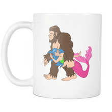 Load image into Gallery viewer, RobustCreative-Bigfoot Sasquatch Carrying Mermaid - I Believe I&#39;m a Believer - No Yeti Humanoid Monster - 11oz White Funny Coffee Mug Women Men Friends Gift ~ Both Sides Printed
