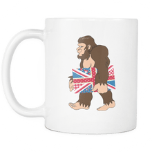 Load image into Gallery viewer, RobustCreative-Bigfoot Sasquatch Carrying Union Jack - I Believe I&#39;m a Believer - No Yeti Humanoid Monster - 11oz White Funny Coffee Mug Women Men Friends Gift ~ Both Sides Printed
