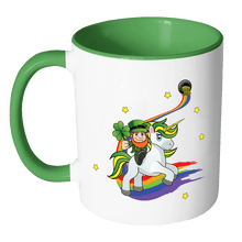 Load image into Gallery viewer, RobustCreative-St Patricks Day Coffee Mug Leprechaun riding on Irish Unicorn holding Shamrock white/green 11 oz
