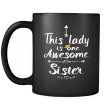 Load image into Gallery viewer, RobustCreative-One Awesome Sister - Birthday Gift 11oz Funny Black Coffee Mug - Mothers Day B-Day Party - Women Men Friends Gift - Both Sides Printed (Distressed)
