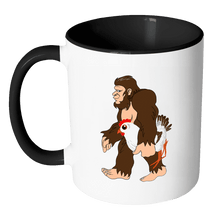 Load image into Gallery viewer, RobustCreative-Bigfoot Sasquatch Carrying Chicken - Robust Creative Believes Aparel - No Yeti Humanoid Monster - 11oz Black &amp; White Funny Coffee Mug Women Men Friends Gift ~ Both Sides Printed
